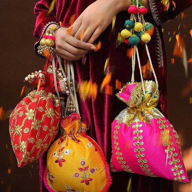 Amazon.com: Designer Women Potli Bags - Rajasthan batwa for Wedding and  Parties - Indian Ethnic Designer Embroidered Silk Pouch Bag- Handle Purse  Clutch Purse for Women - Batwa Pearls Handle Bag, Pack